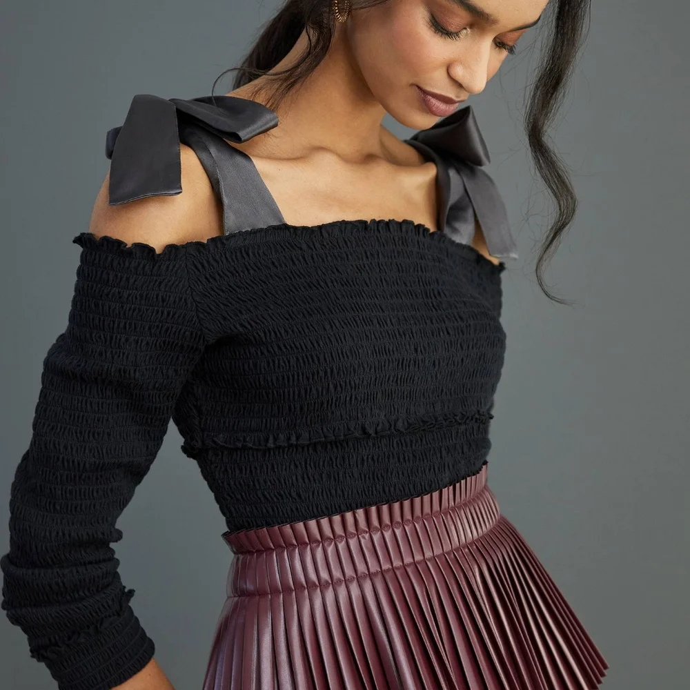 Anthropologie bow off shoulder smocked top black